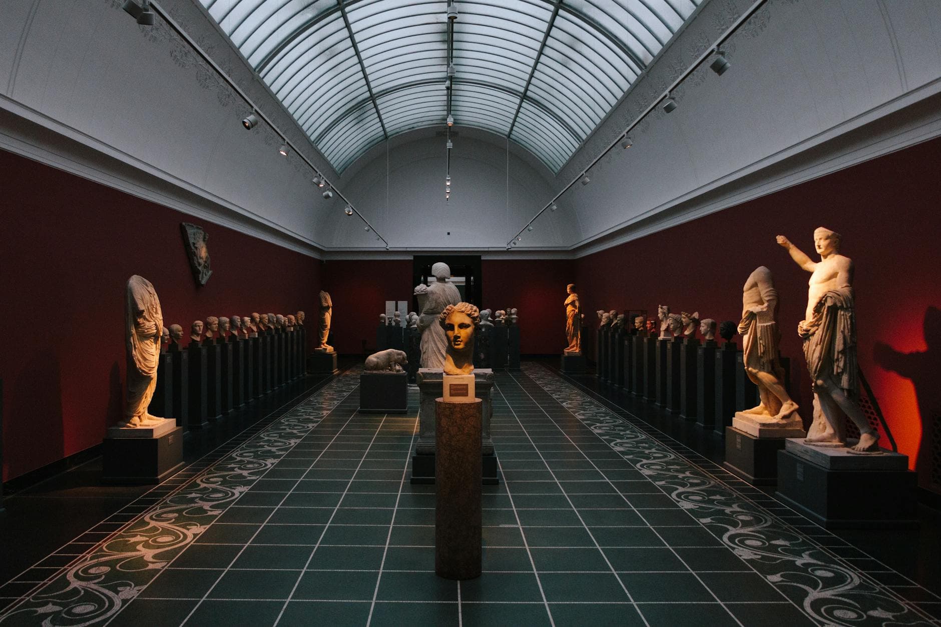 Explore ancient sculptures at Copenhagen's Ny Carlsberg Glyptotek museum, Denmark.