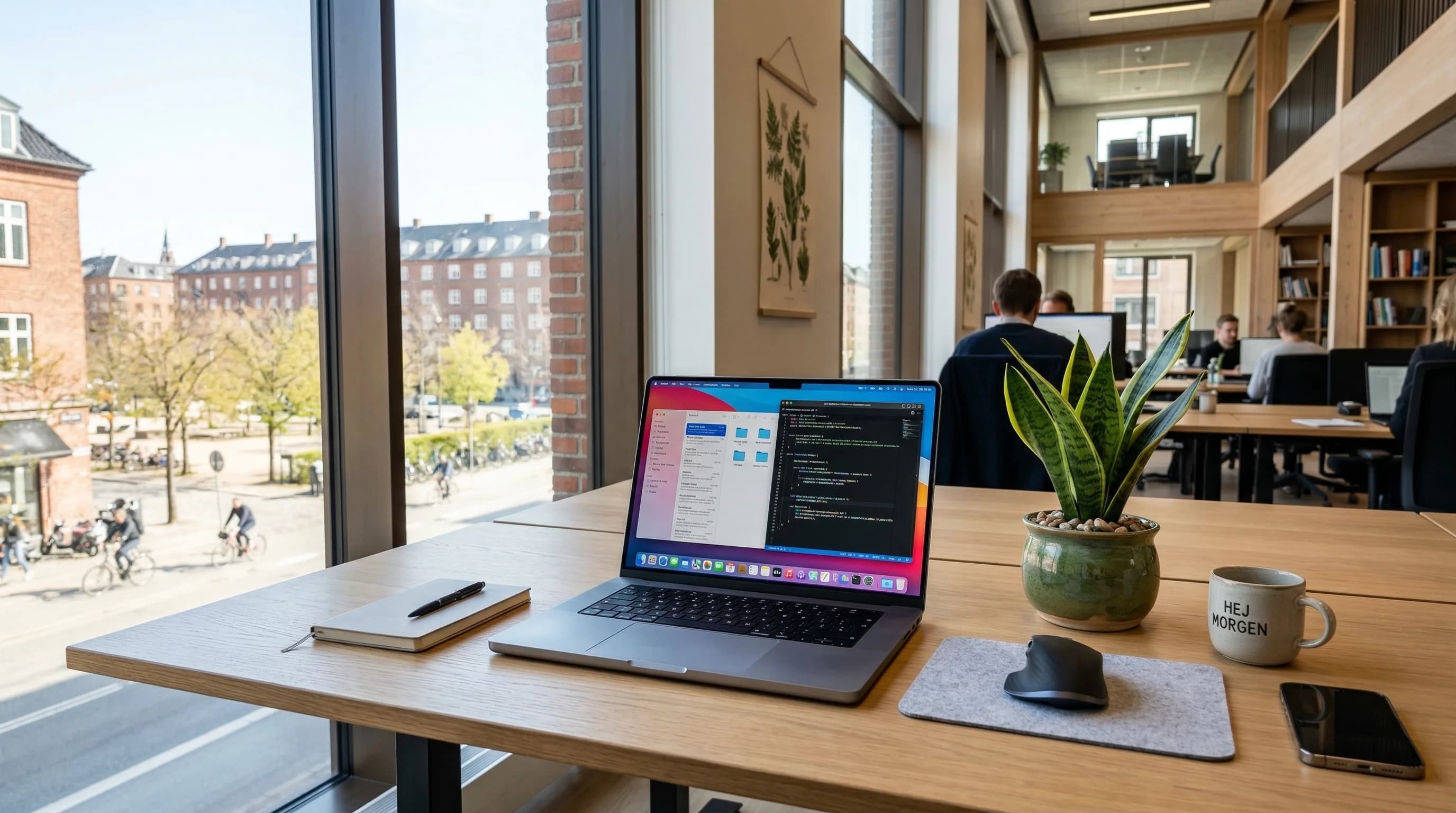 A photorealistic wide-angle shot of a modern, bright office desk in Northern Europe. A clean, high-quality laptop sits next to a small green potted plant, representing longevity and sustainable care f
